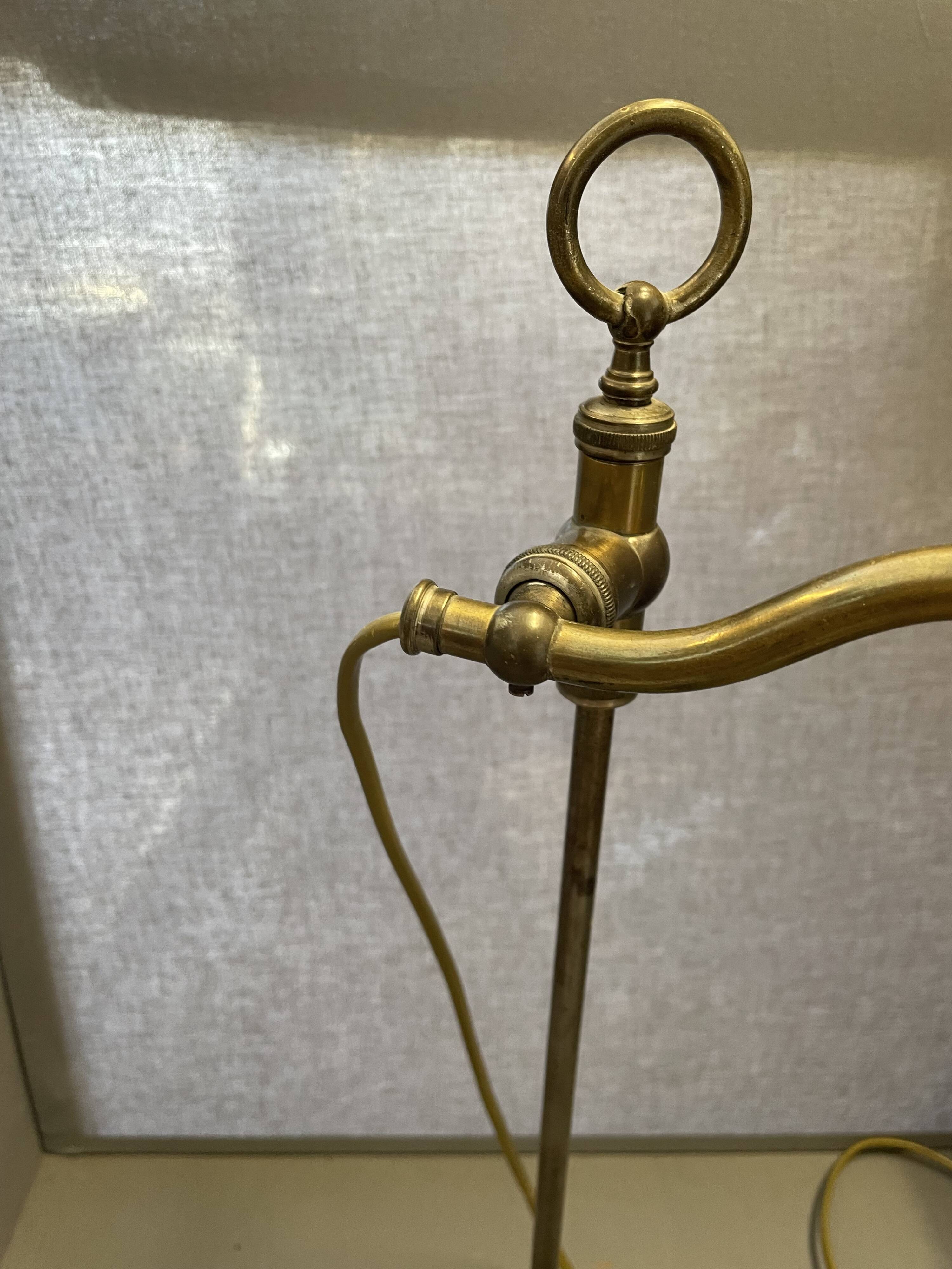 brass lamp that raises and lowers