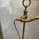brass lamp that raises and lowers