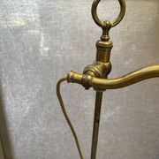 brass lamp that raises and lowers