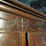 French oak armoire, late 17th - early 18th century, Louis XIV provincial style with hand-carved rosettes