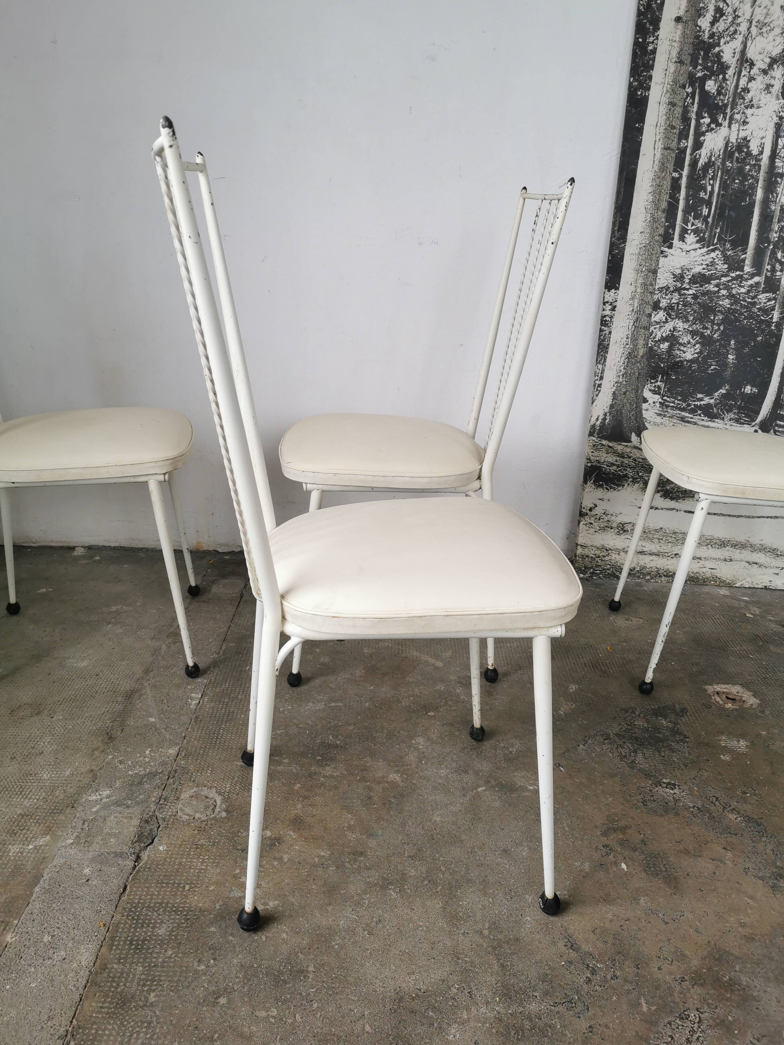 Set of 4 vintage chairs in metal and Skai