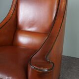 Design armchair in cowhide leather