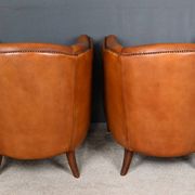 Pair of Solange club armchairs in sheepskin leather – reproduction