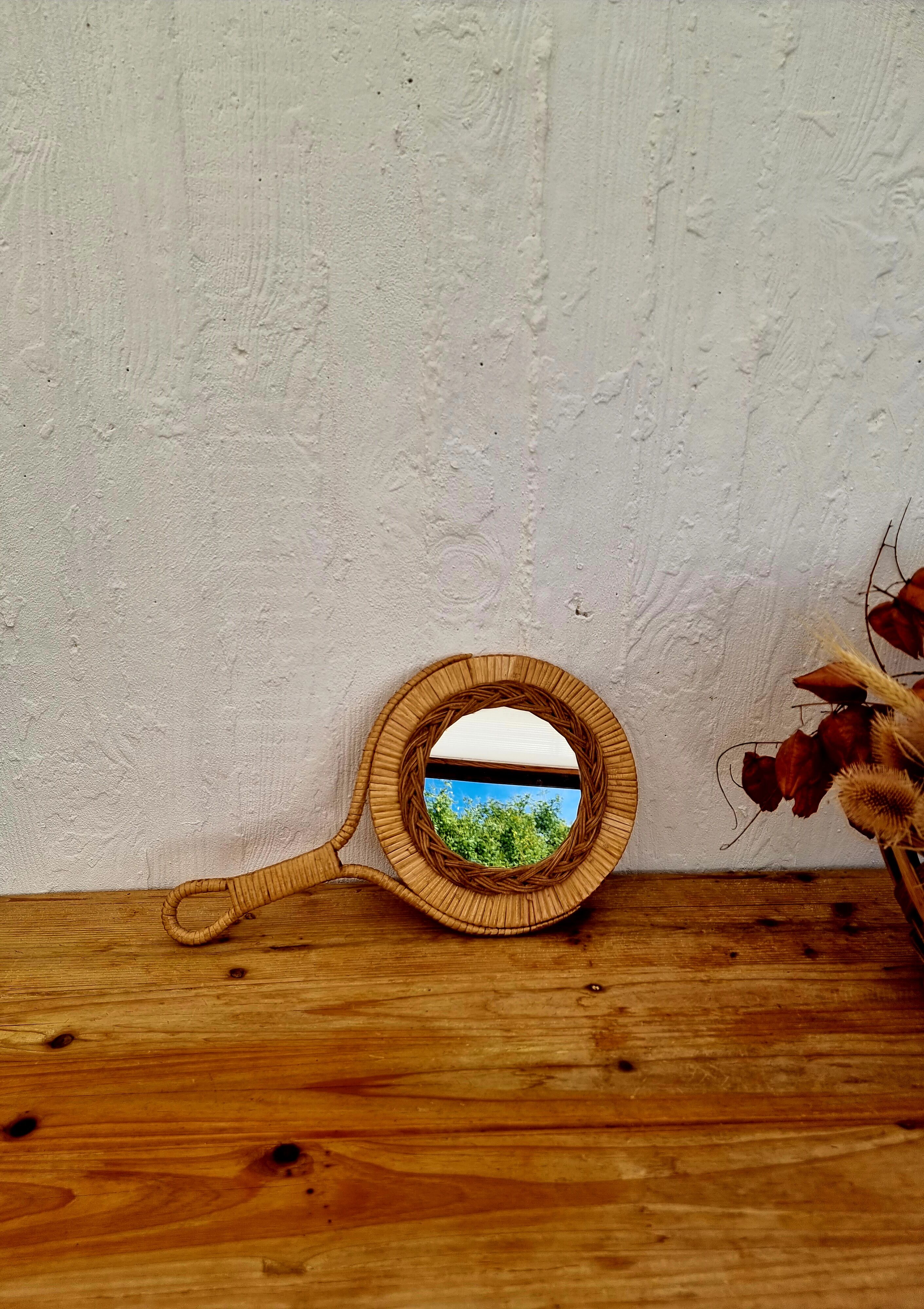 Vintage rattan hand mirror