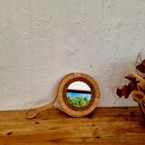 Vintage rattan hand mirror