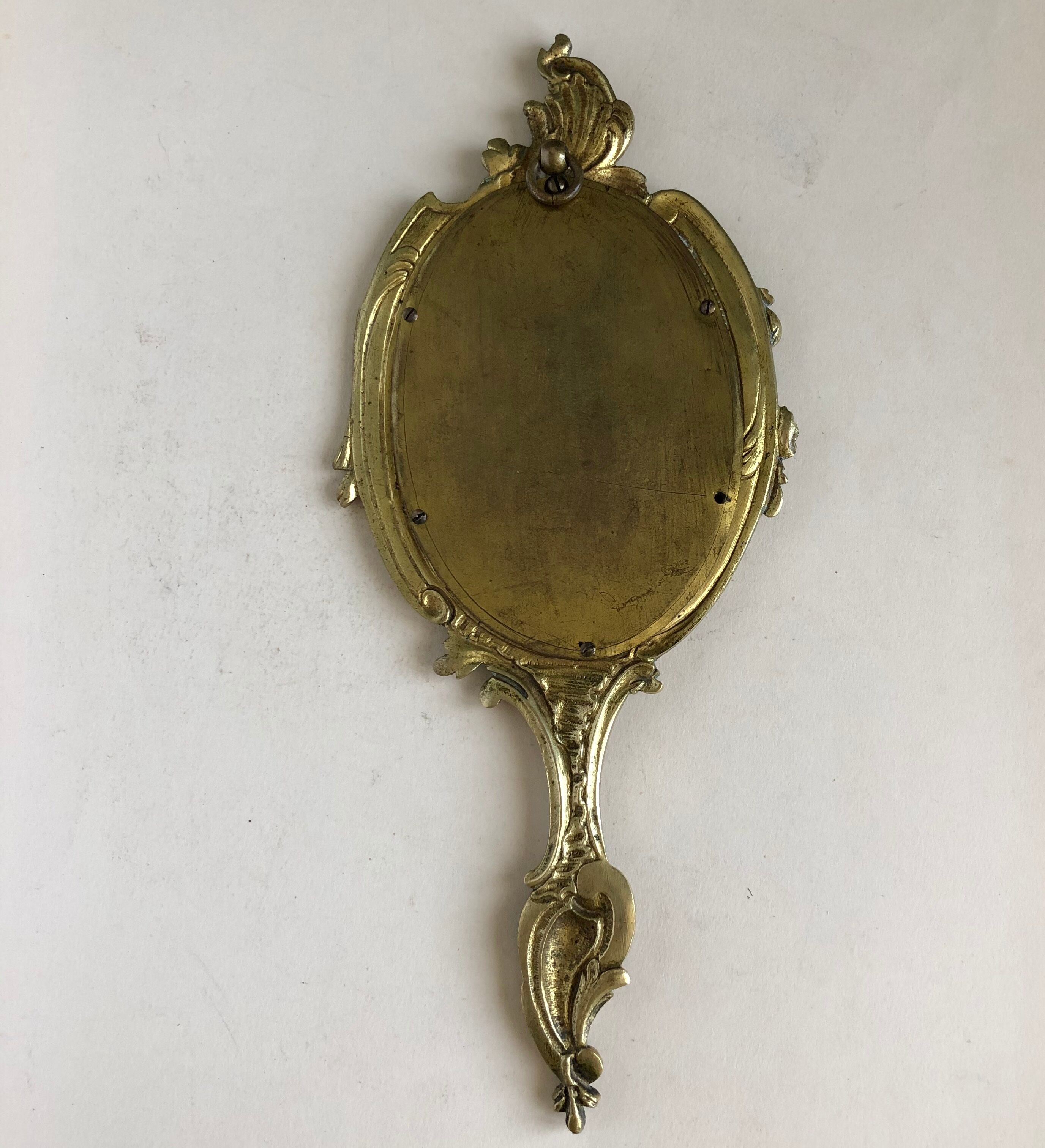 Hand-faced mirror