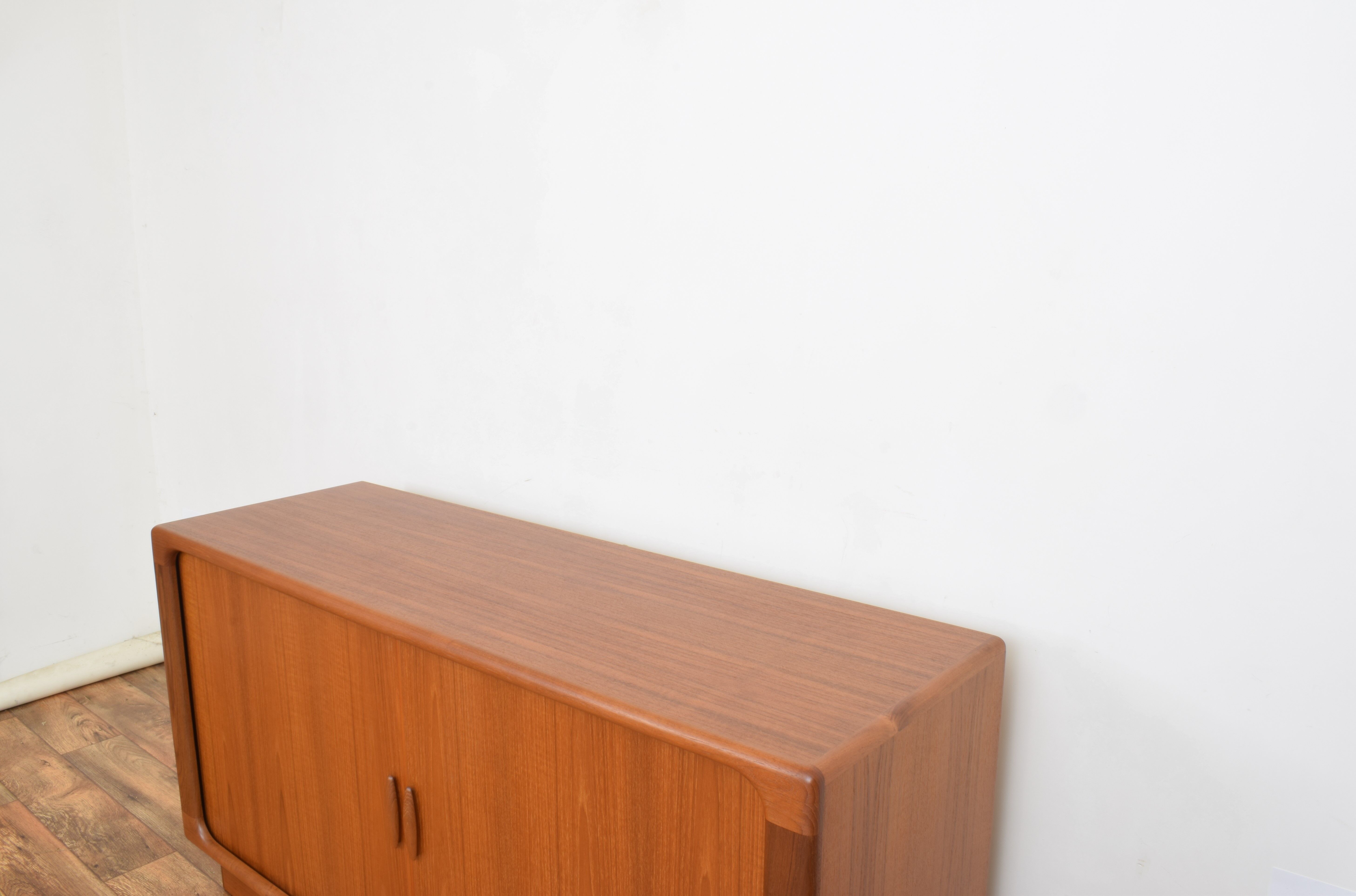 Mid-century danish teak sideboard with tambour doors from dyrlund, 1960s.