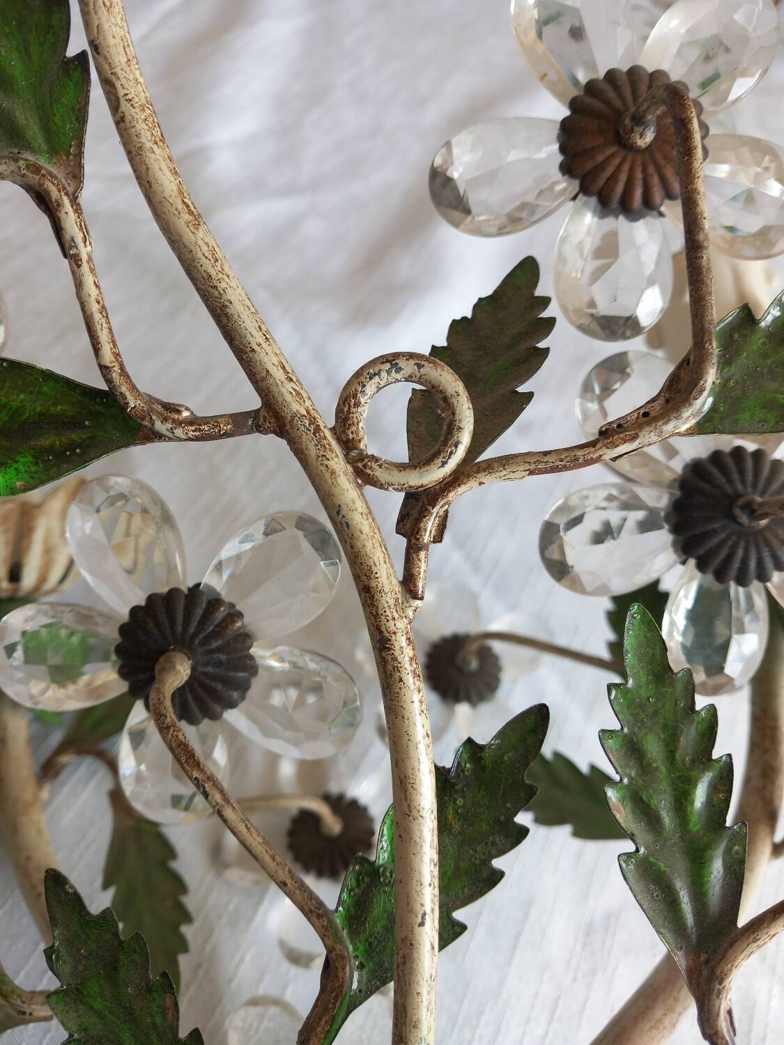 Pair of Italian Florentine wall sconces in tin and glass.