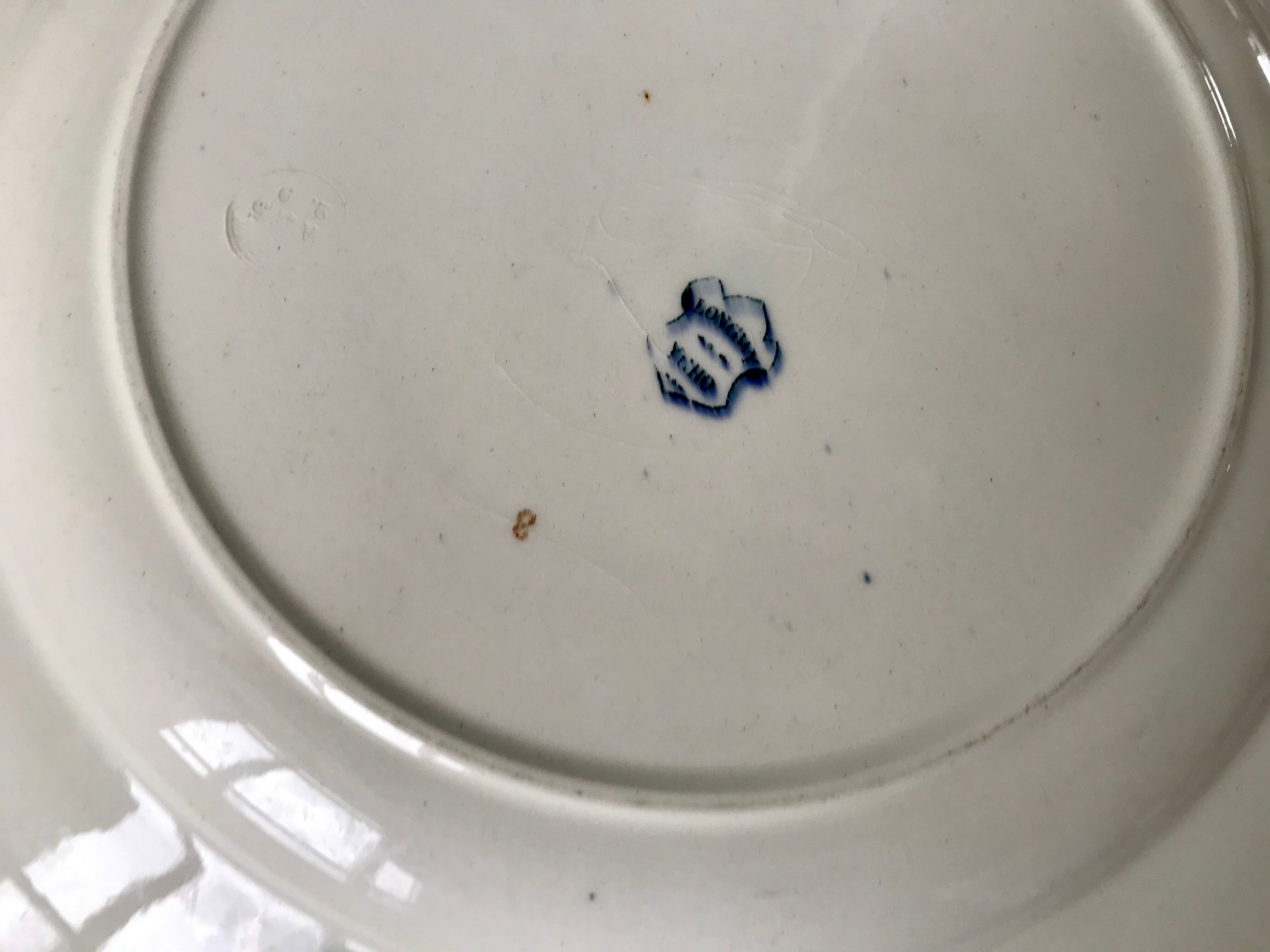 large round flat Terre de Fer Longwy model "YCHO" late nineteenth