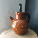 Glazed amber jug