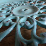Dessous de plat ancien en fonte émaillé