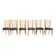 6 chaises bois et skaï noir années 60