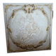 wall panel with angels in stucco and weathered wood