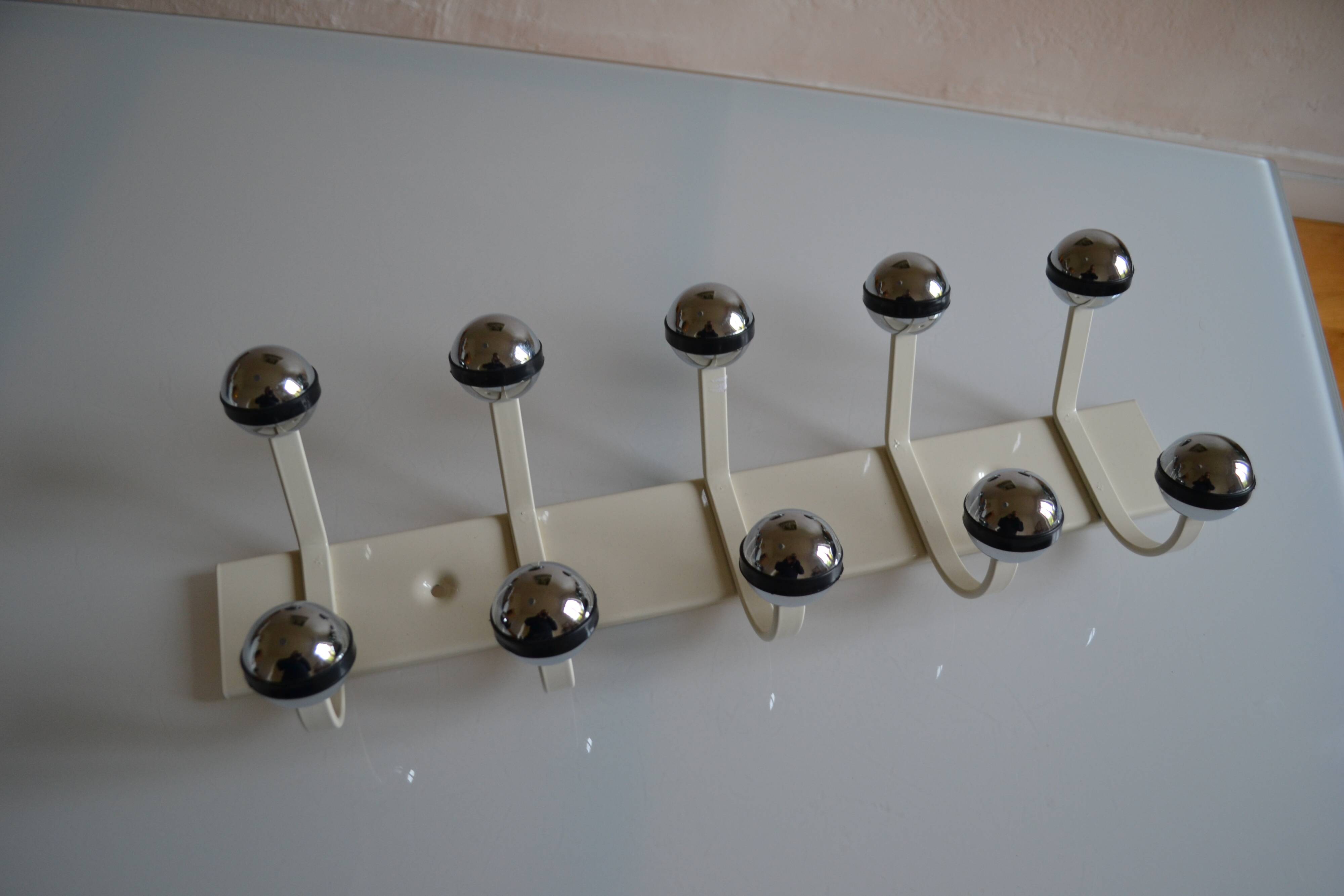 Vintage 1970s wall-mounted coat rack with 10 hooks