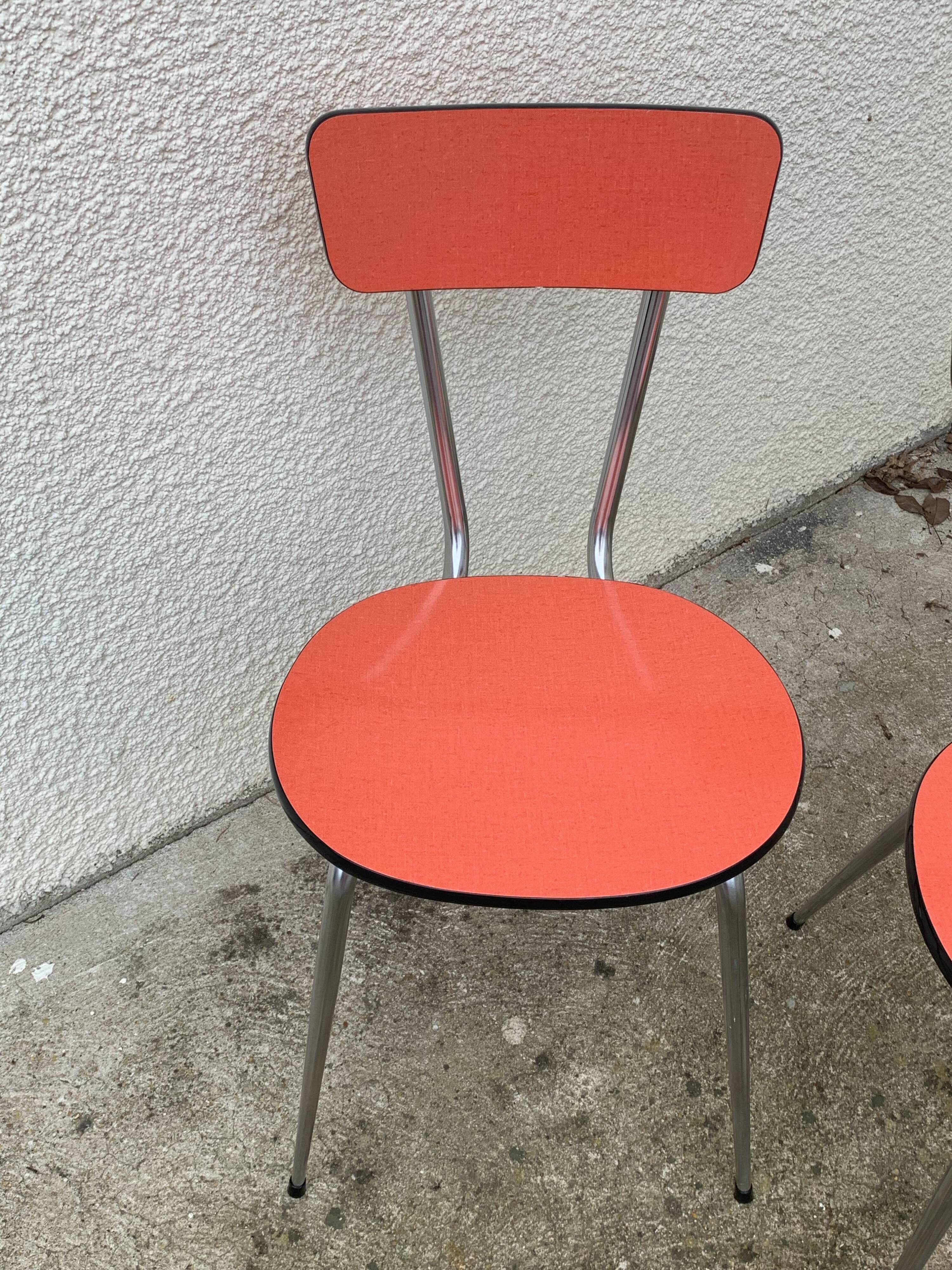 Red formica chairs 1950