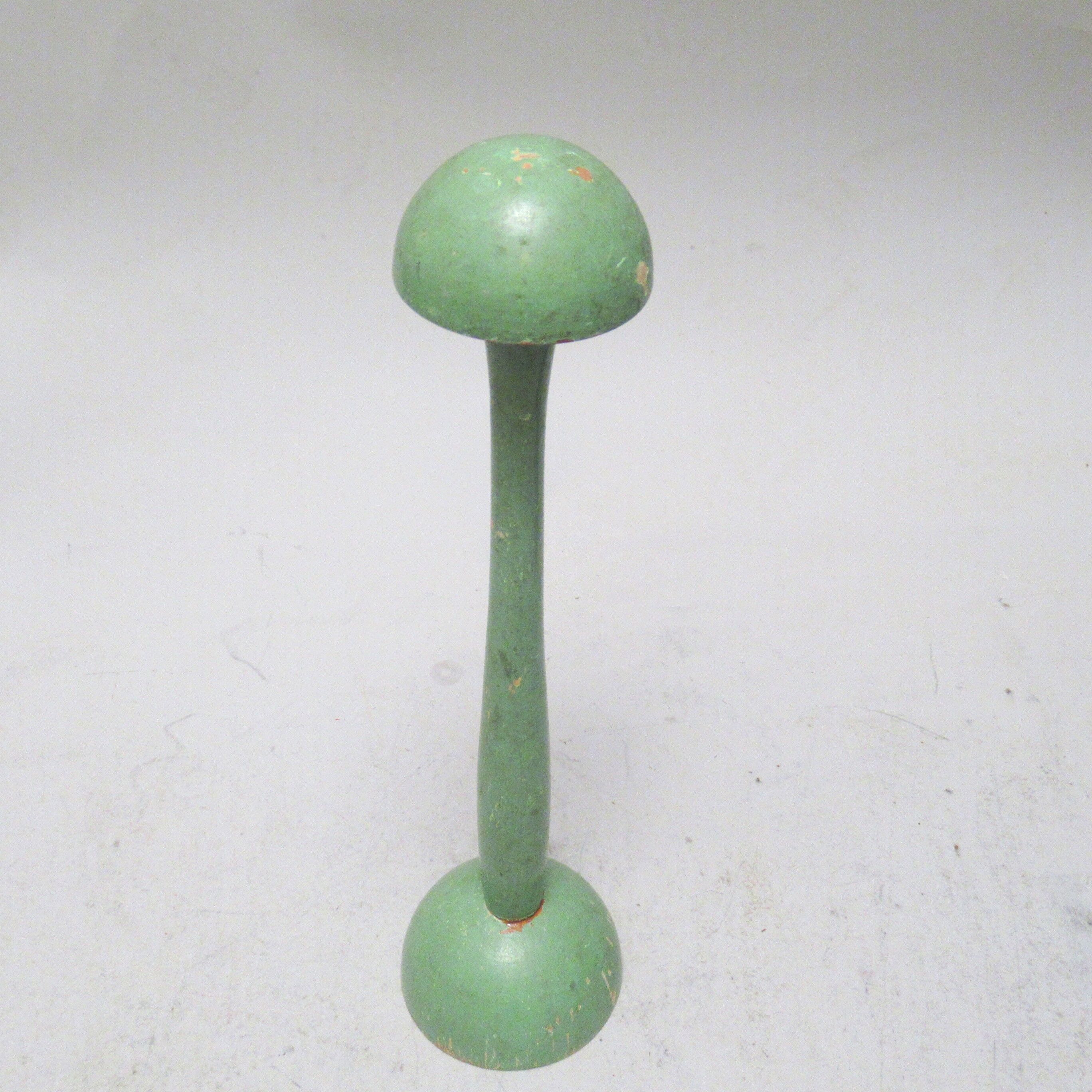 Green wooden hat holder