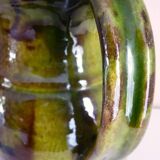 Pitcher vase, thick green glazed terracotta, signature to be identified
