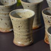 8 stoneware cups/mugs by Gustave Tiffoche