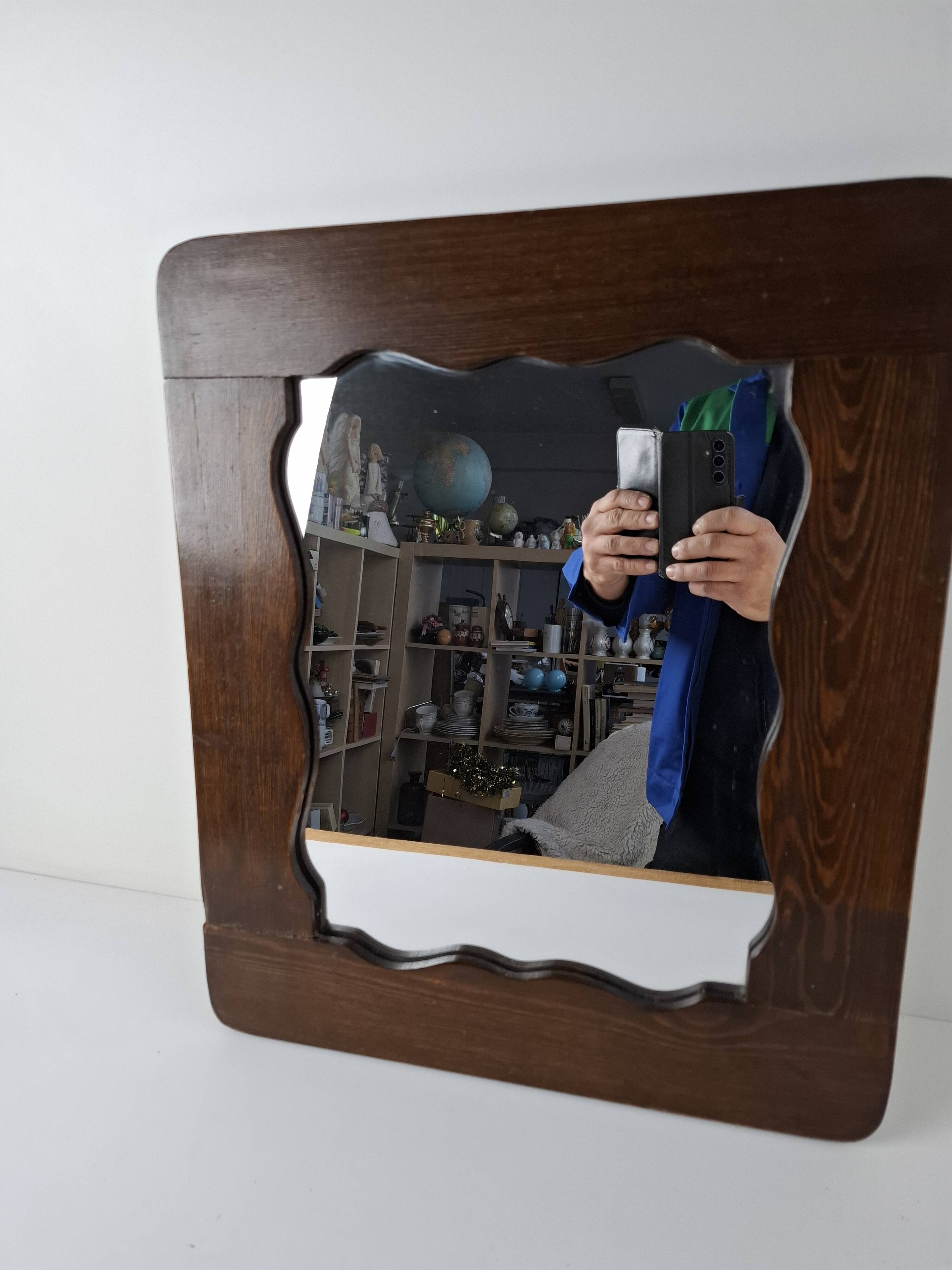 Czechoslovakian wall mirror with a wavy wooden frame, mid-century, 1940s