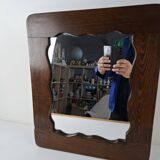Czechoslovakian wall mirror with a wavy wooden frame, mid-century, 1940s