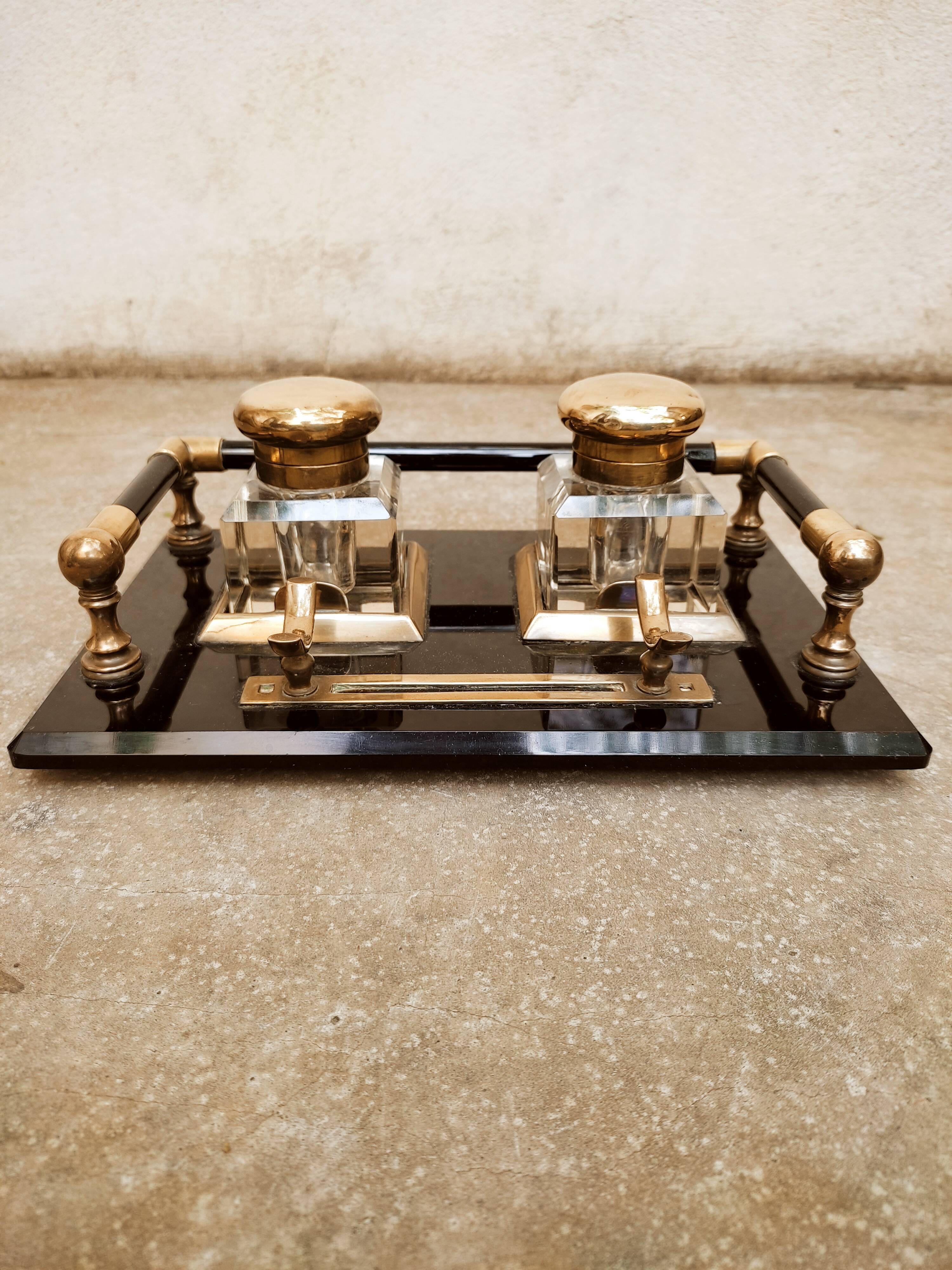 Hence the art deco inkwell on jet plate brass finishes