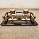 Hence the art deco inkwell on jet plate brass finishes