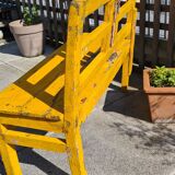 Old yellow teak school bench