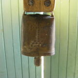 Necklace and cowbell