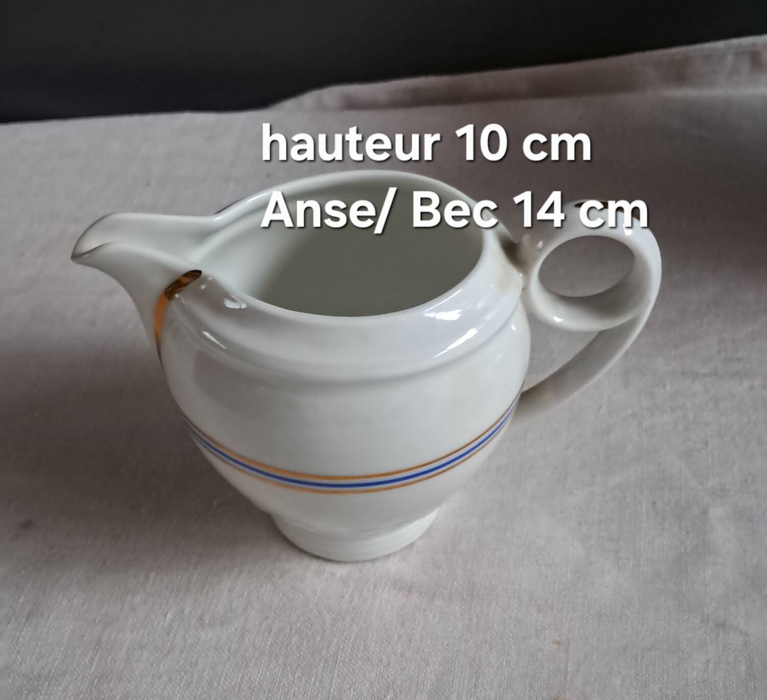 Teapot, sugar bowl, milk jug, jam jar.