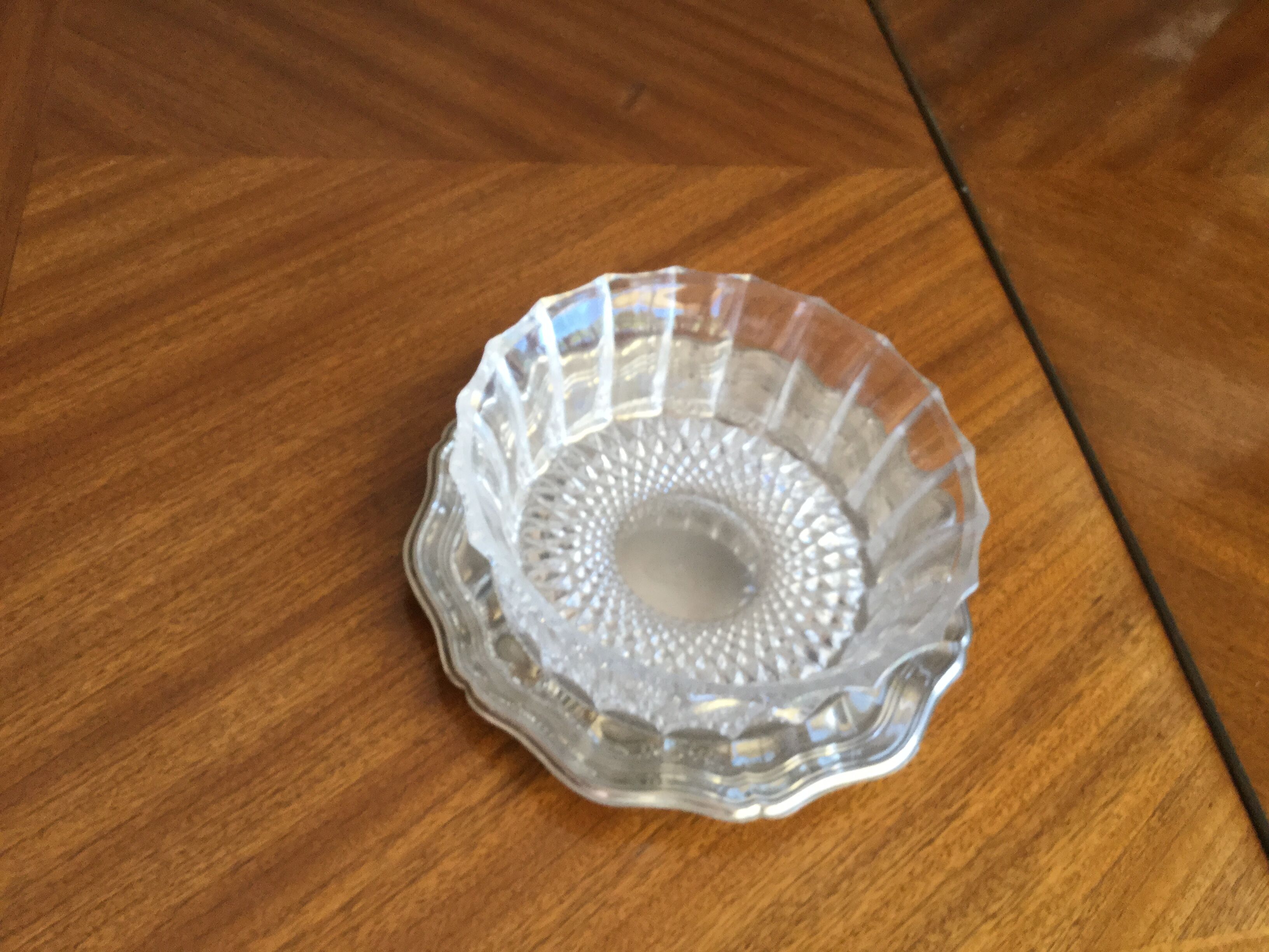 Crystal ravier on silver metal presentation plate