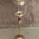 Glass photophore on high metal foot with silver patina