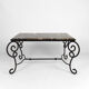 Table basse en fer forgé patiné et marbre, circa 1940