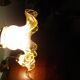 Wall lamps, opaque corolla and iridescent ochre lampshade, brass and wood support