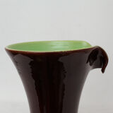 Brown and green vase with open edge rolled up