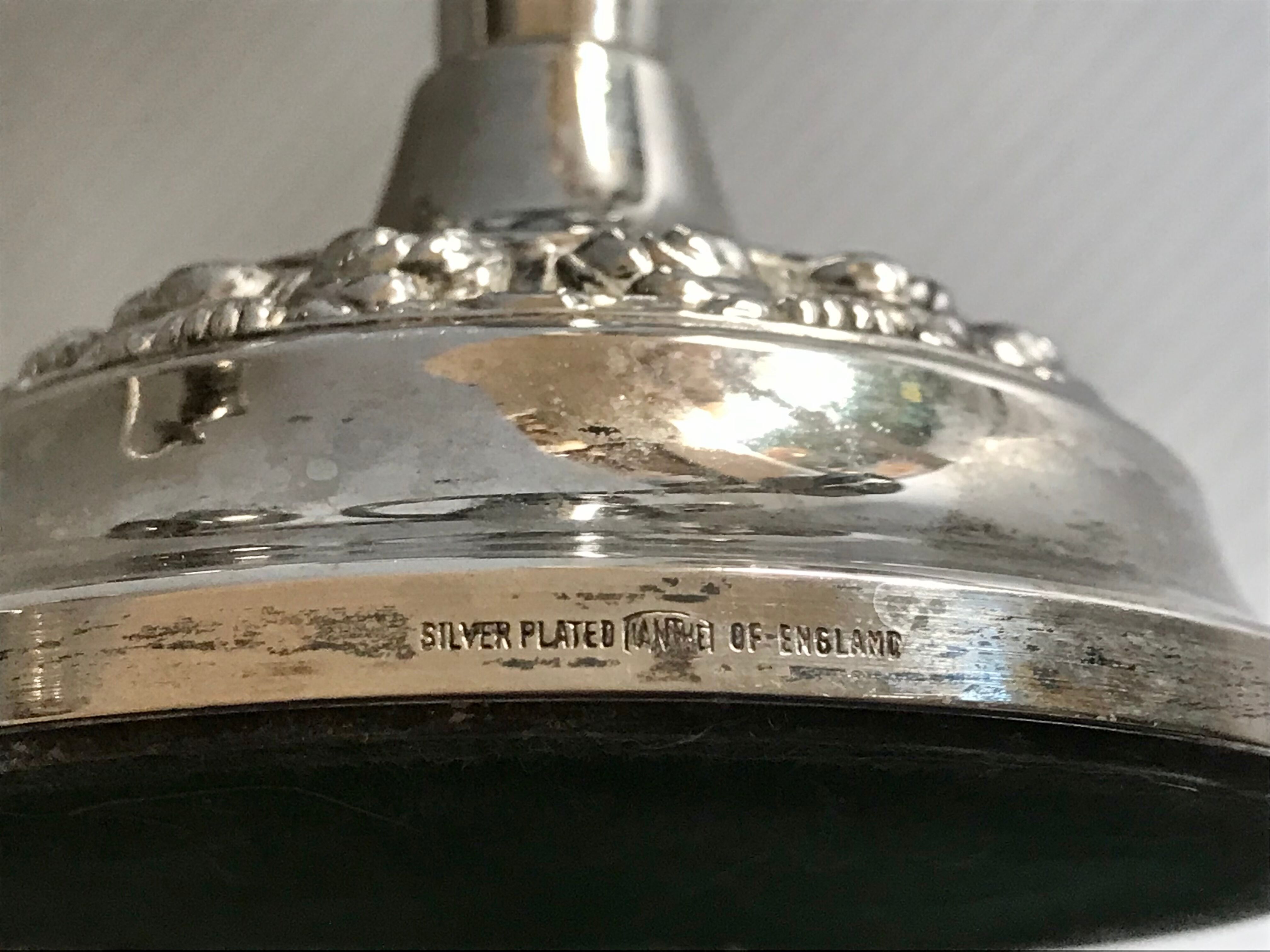 Pair of silver metal chandeliers