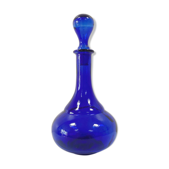 Antique decanter made of cobalt blue glass