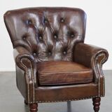 Cognac colored brown grained cowhide chesterfield armchair