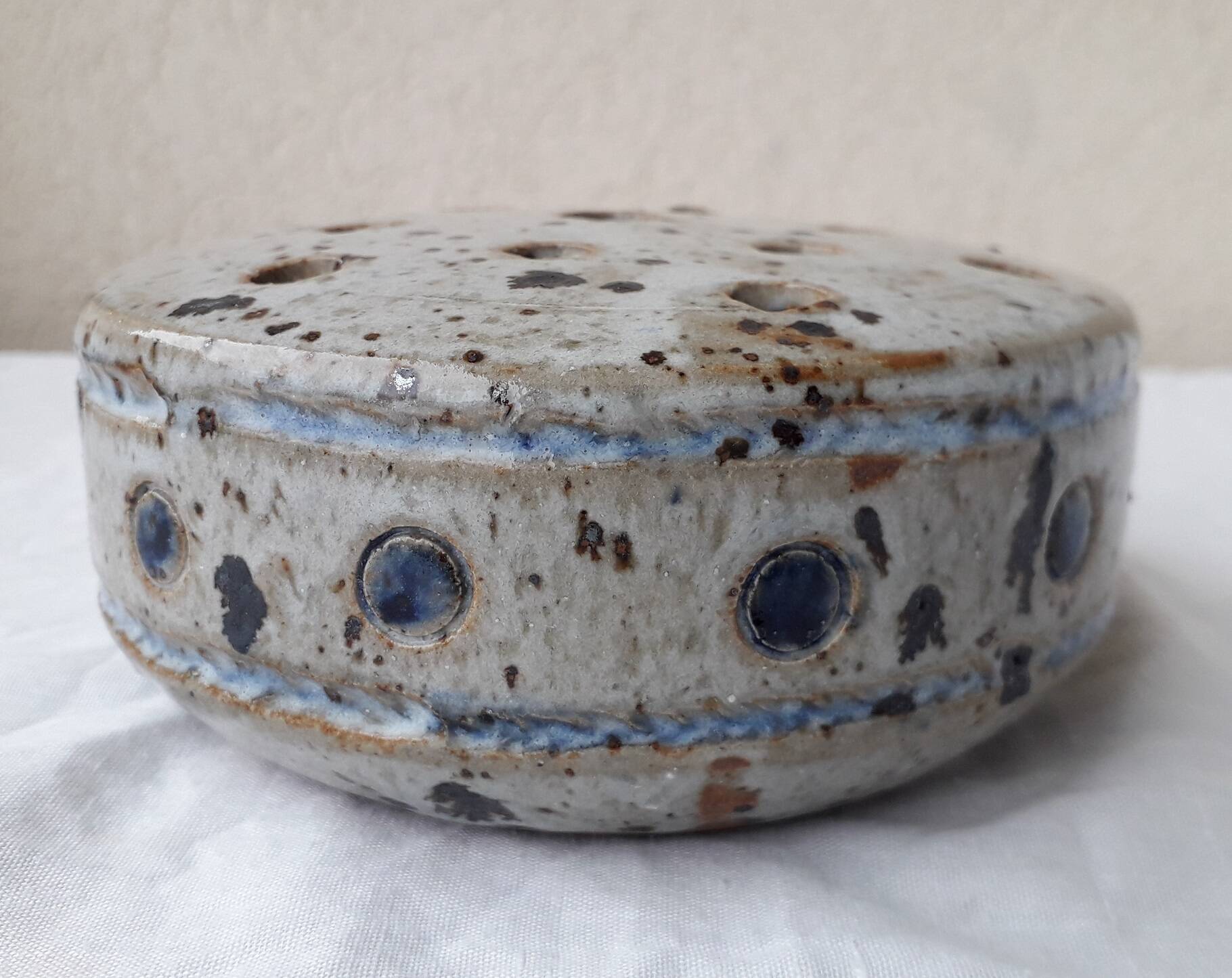 Flower holder in stoneware