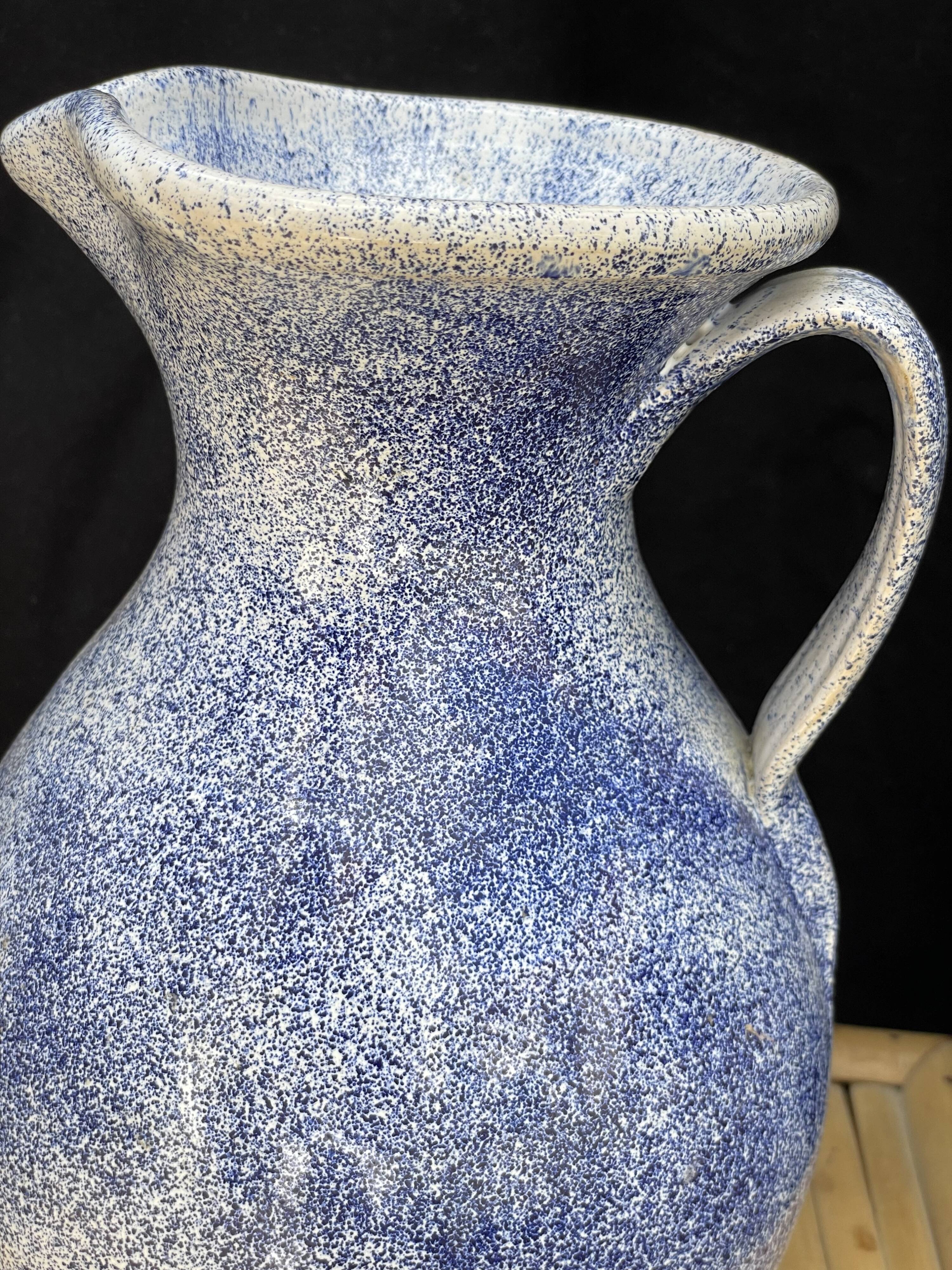 Pitcher in blue speckled terracotta signed made in Malaye numbered vintage.very good condition.