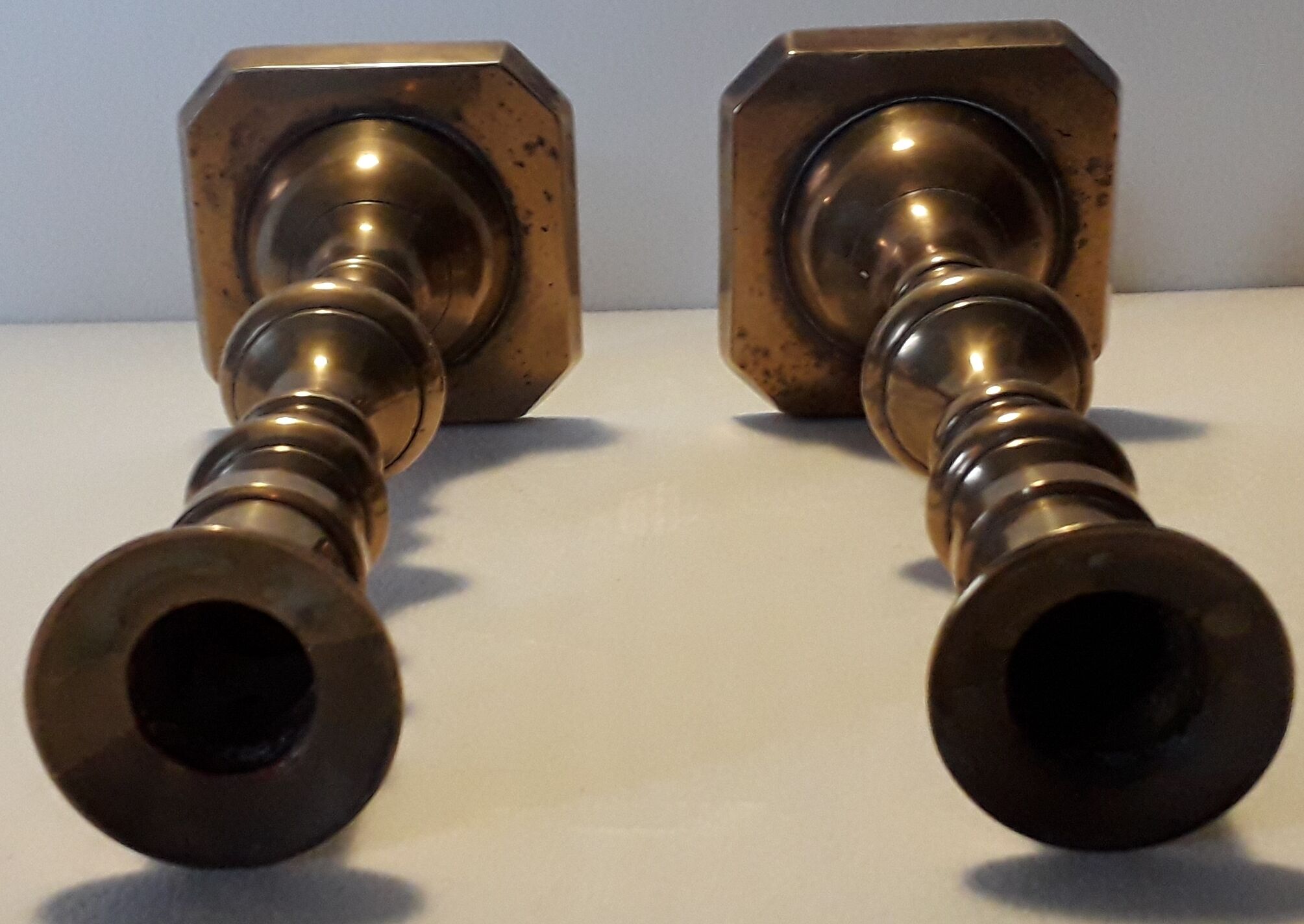 Duo of brass candle holders