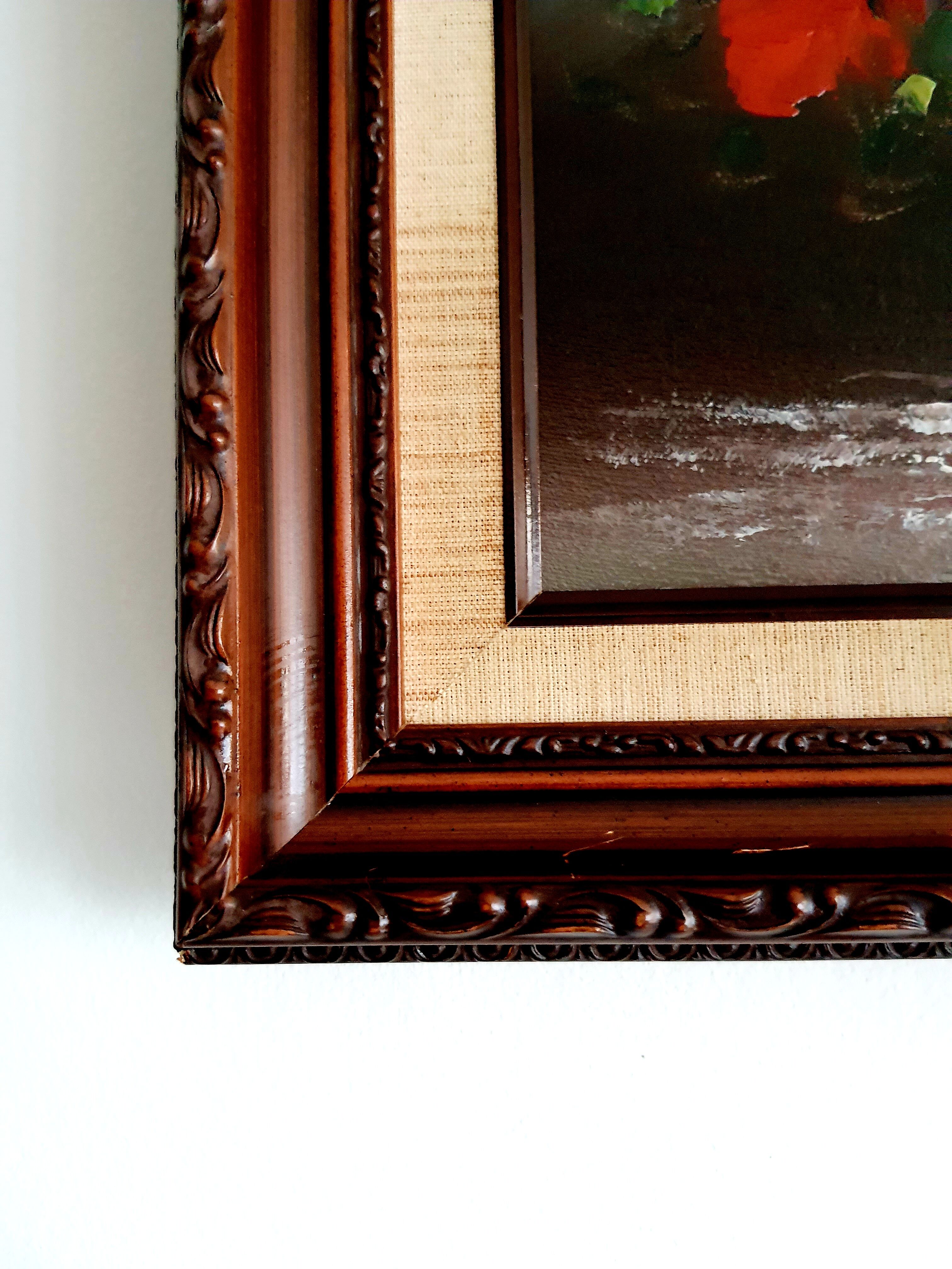 Oil on canvas bouquet of red flowers signed