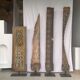 Rectangular Indonesian construction element with blue and yellow plant in carved wood