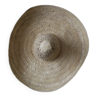 Hand-woven wicker straw hat, ethnic decoration object, sombrero, handmade