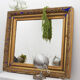 Golden antique mirror with leaf and bright king blue