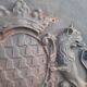Plaque de cheminée en fonte décors aux lions