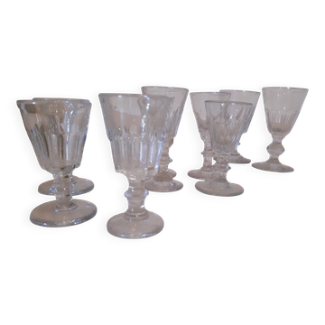 Set of 9 small cut glass stemmed glasses from the 1930s, in various sizes.
