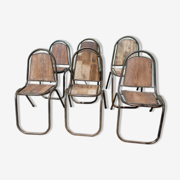 Set of 6 indu chairs in metal and exotic wood.
