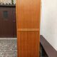 Old boarding school locker in golden oak