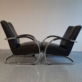 Pair of tubular armchairs