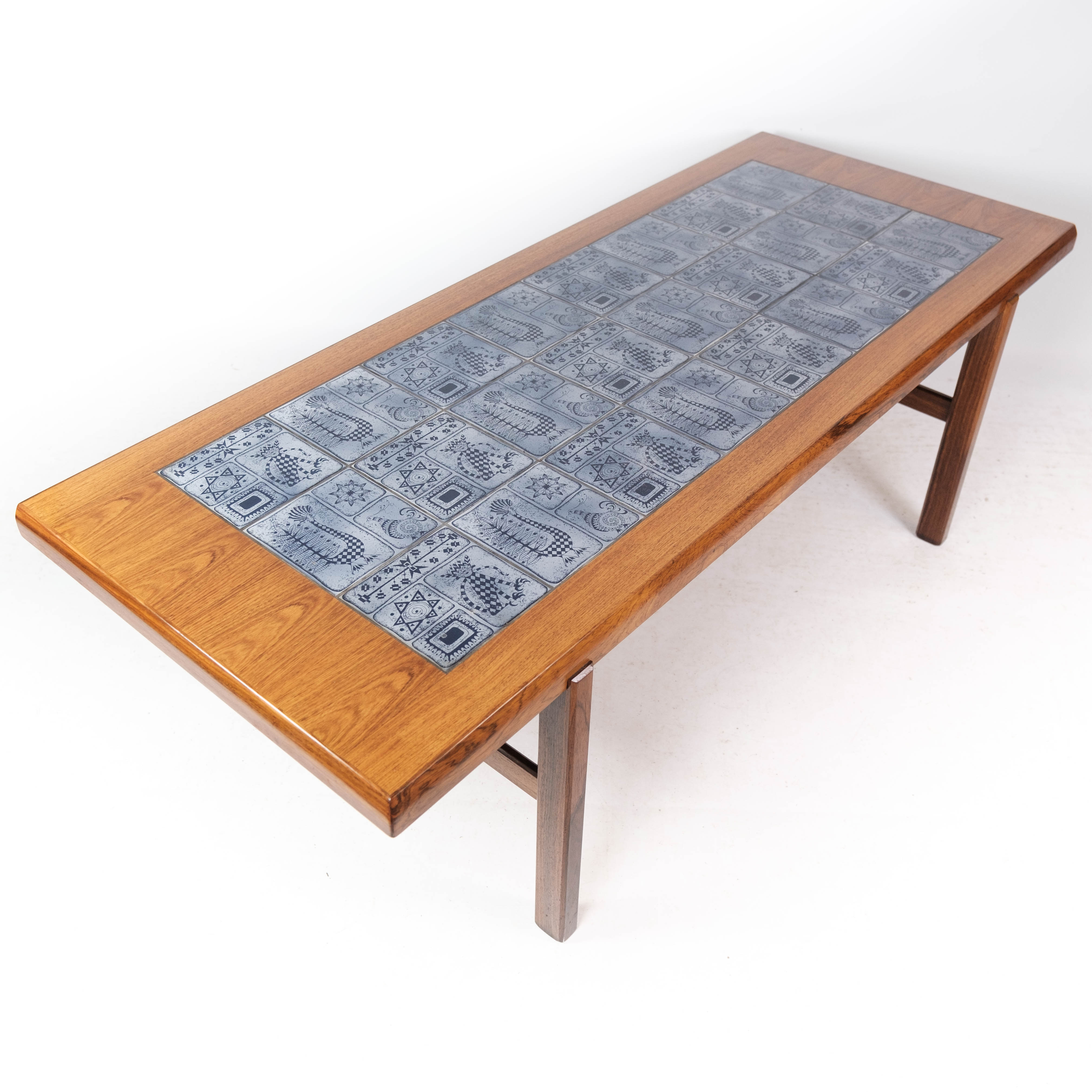 Coffee table in rosewood with blue tiles of Danish design by Arrebo Furniture, 1960s